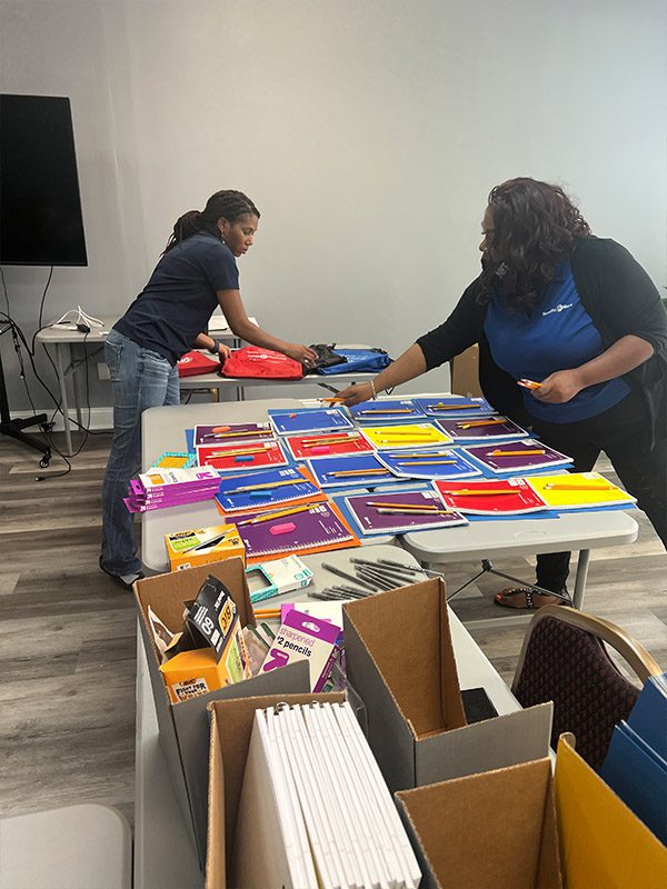 Community Involvement - Donating School Supplies in a Building