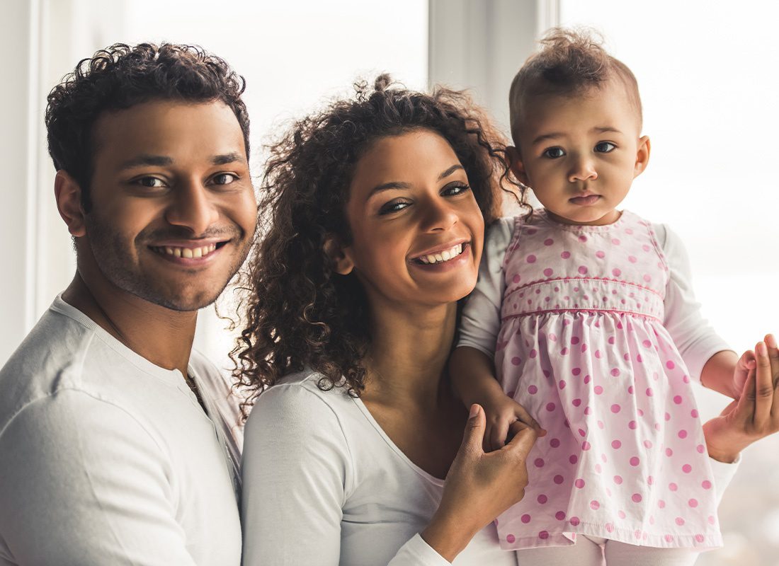 Life Insurance - Happy Family Portrait with Young Child